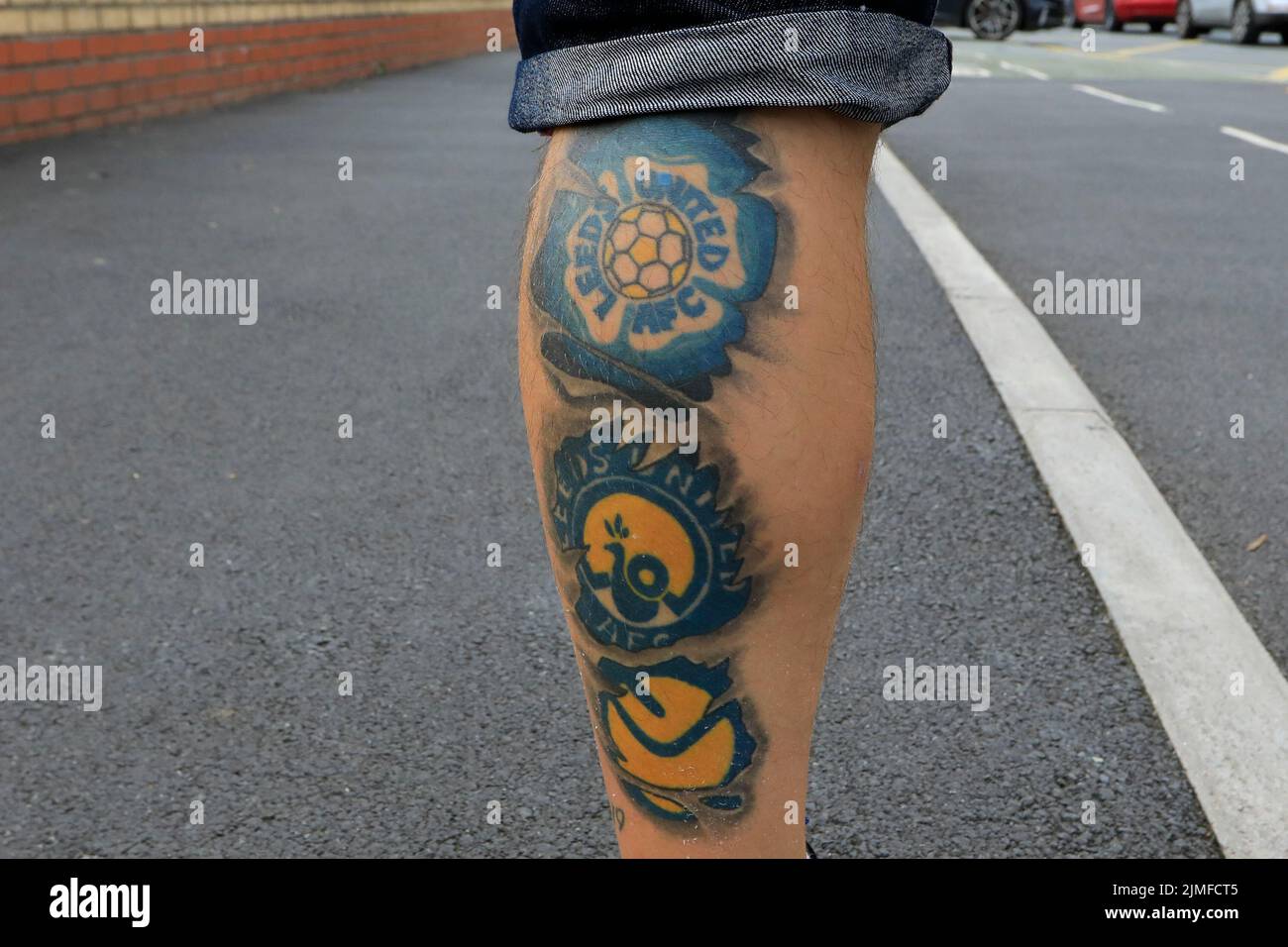 Leeds United fan sporting his club tattoo’s Stock Photo Alamy