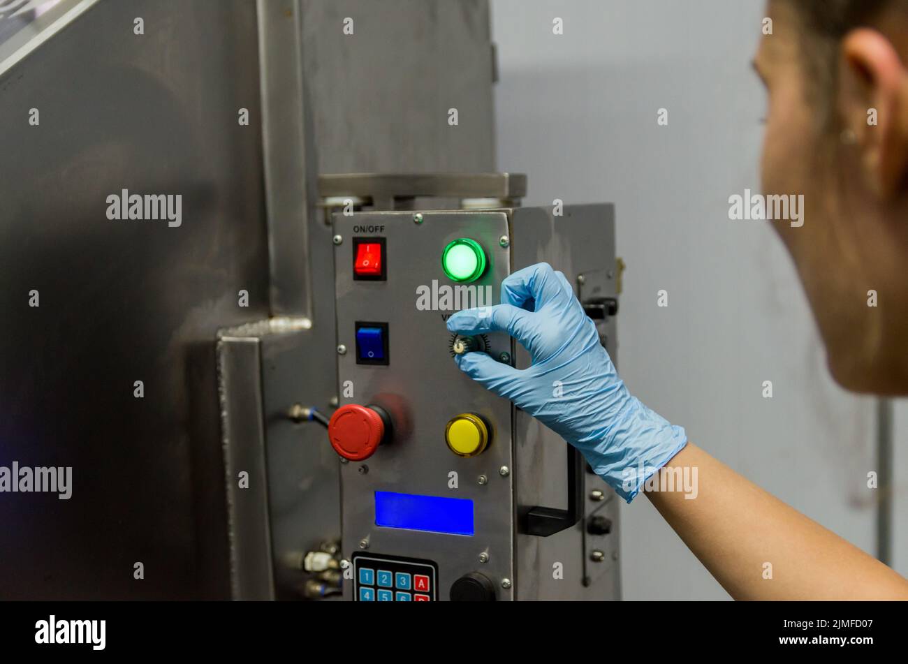 Adjusting uniform hi-res stock photography and images - Alamy