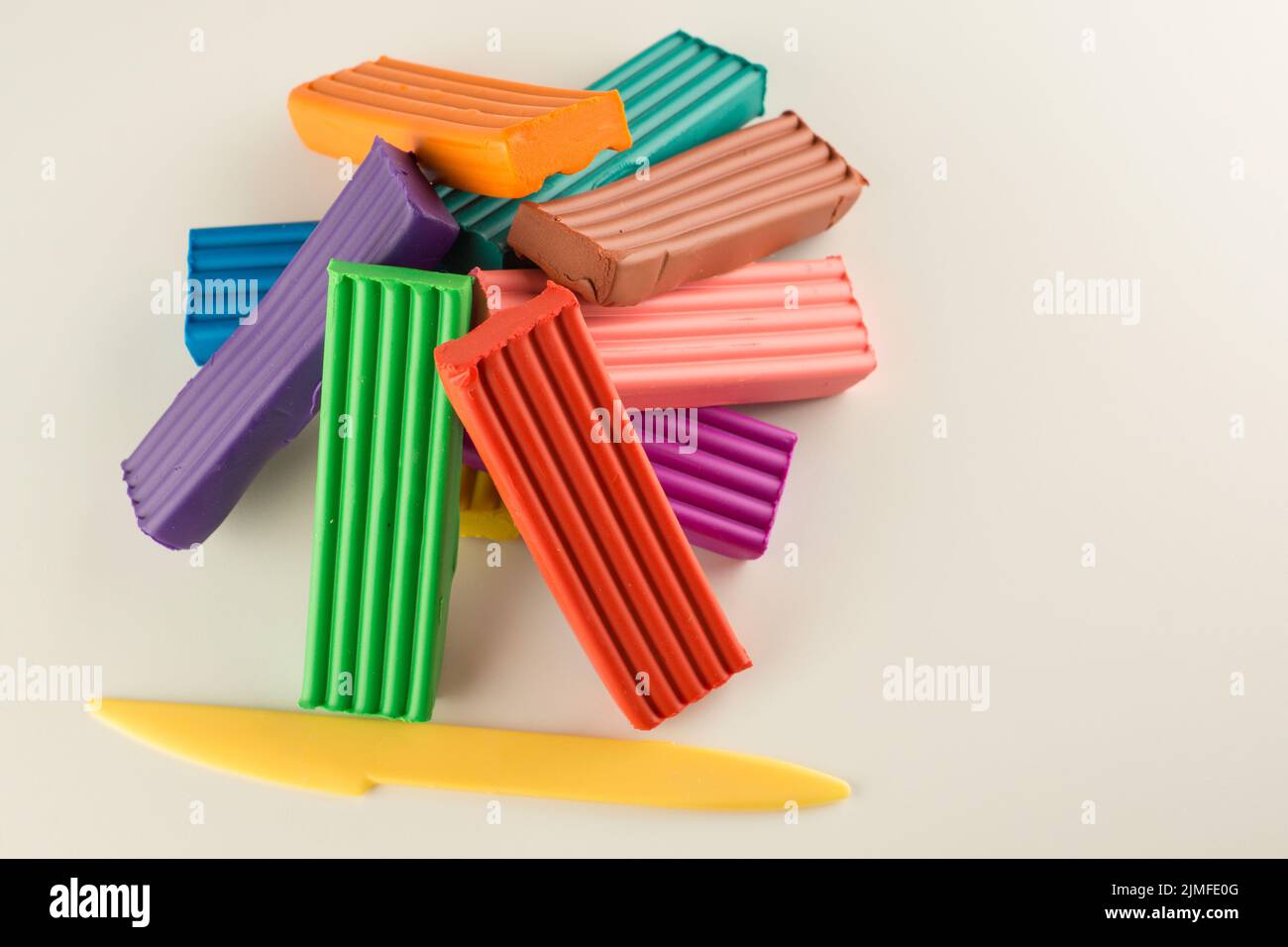children color wax plasticine for creativity isolated on a white background Stock Photo
