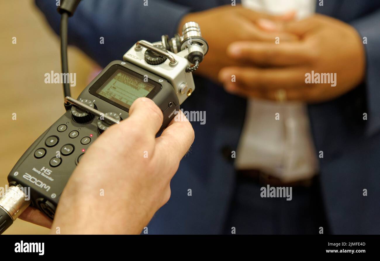 Calvert City, KY, USA. 05 Aug 2022. A reporter conducts an interview ...