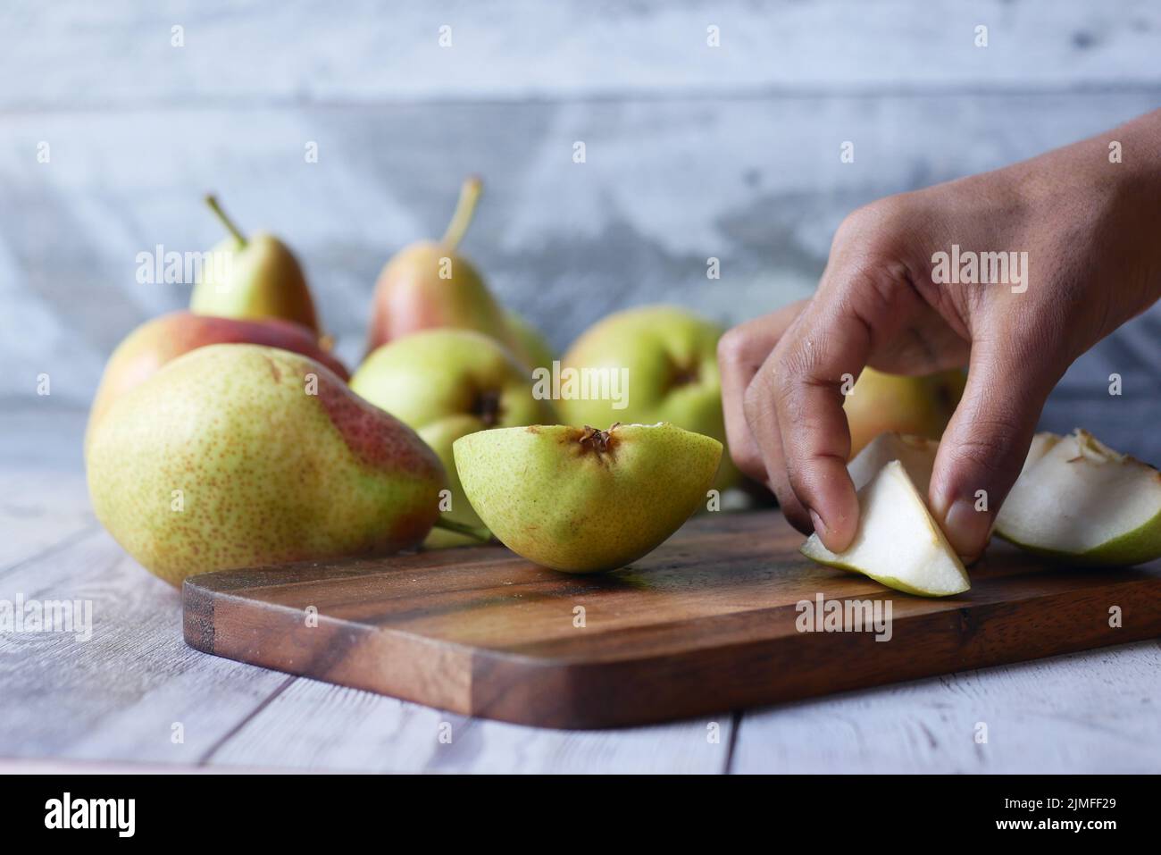 slice of fresh pears on table close up Stock Photo