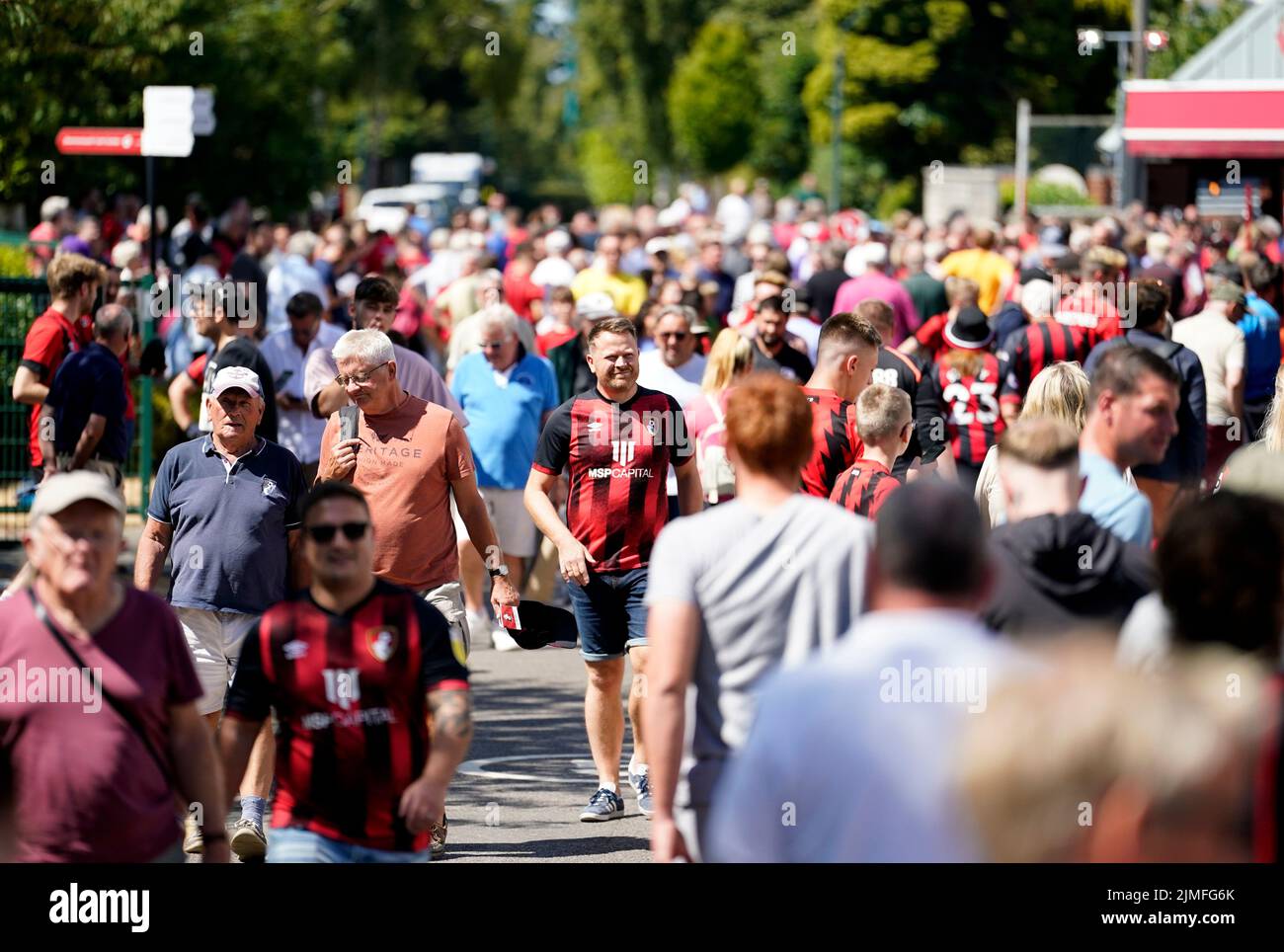Fans make their way to the stadium prior to the Premier League match at the Vitality Stadium, Bournemouth. Picture date: Saturday August 6, 2022. Stock Photo
