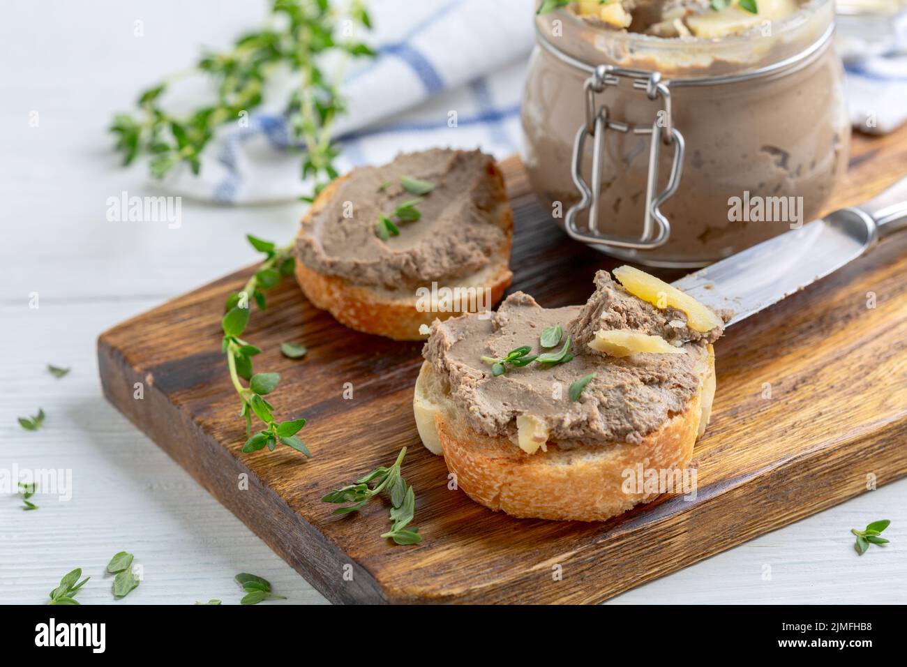 Homemade pate on baguette slices. Stock Photo