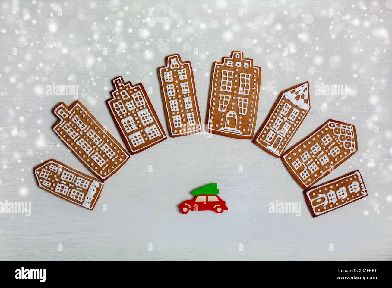 Christmas card with gingerbread houses. Stock Photo