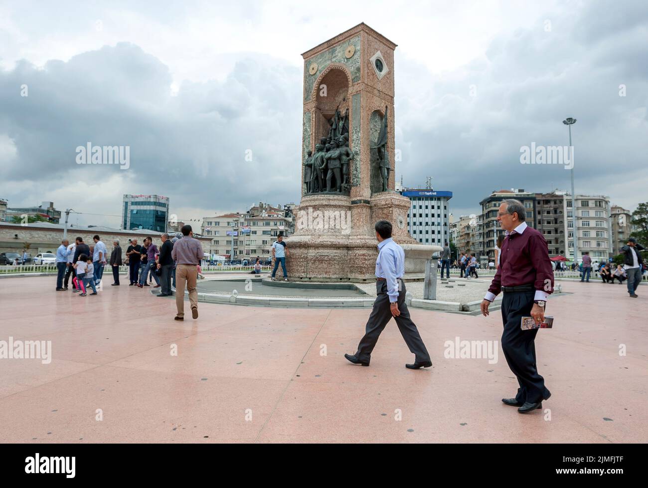 People gathered near the Republic Monument in Taksim Square at Istanbul in Turkey. It commemorates the formation of the Turkish Republic in 1923. Stock Photo