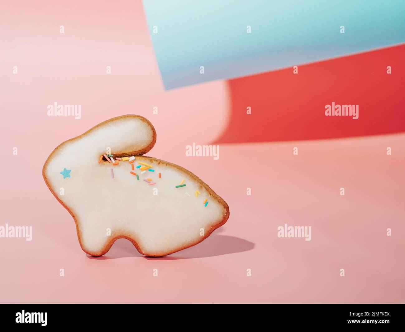 Easter bunny cookie on pink. Easter concept Stock Photo