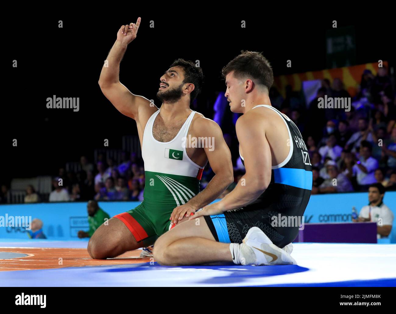 Pakistan’s Muhammad Sharif Tahir celebrates winning against New Zealand’s Cole Hawkins the Men’s Freestyle 74kg Semi Final at the Coventry Arena on day nine of the 2022 Commonwealth Games. Picture date: Saturday August 6, 2022. Stock Photo
