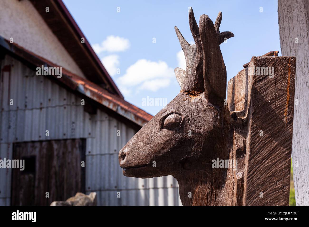 Head of a deer made from wood, Lokve. Slovenia Stock Photo