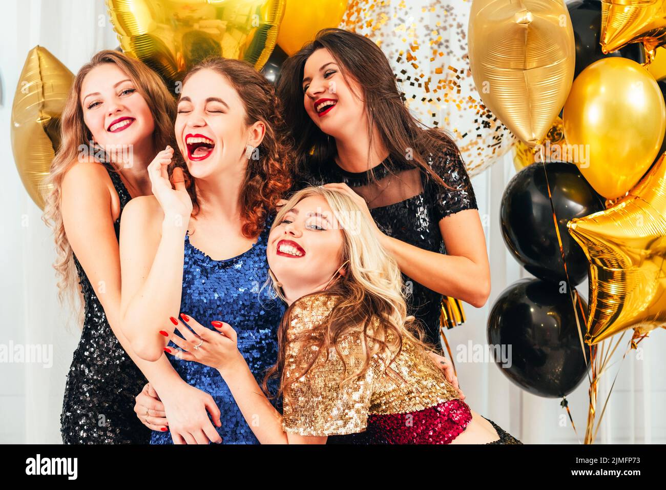 fancy cocktail party entertainment amused girls Stock Photo