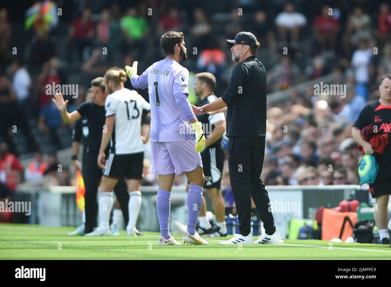 London, UK. 06th Aug, 2022. JŸrgen Klopp manager of Liverpool and Alisson Becker of Liverpool during the Premier League match between Fulham and Liverpool at Craven Cottage, London, England on 6 August 2022. Photo by Salvio Calabrese. Editorial use only, license required for commercial use. No use in betting, games or a single club/league/player publications. Credit: UK Sports Pics Ltd/Alamy Live News Stock Photo
