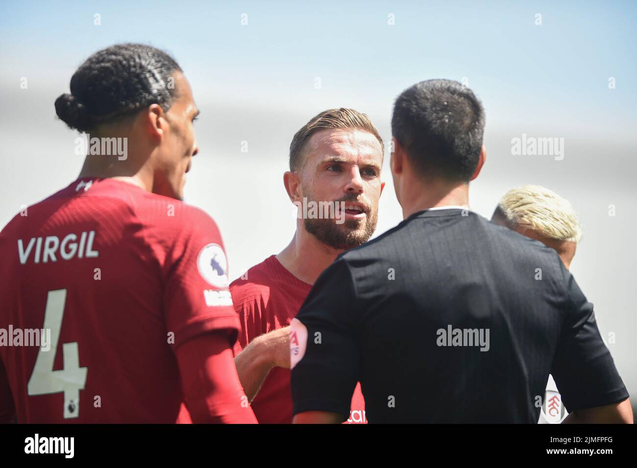 London, UK. 06th Aug, 2022. Jordan Henderson of Liverpool and Virgil van Dijk of Liverpool argues with the referee after he concedes a penalty to Fulham during the Premier League match between Fulham and Liverpool at Craven Cottage, London, England on 6 August 2022. Photo by Salvio Calabrese. Editorial use only, license required for commercial use. No use in betting, games or a single club/league/player publications. Credit: UK Sports Pics Ltd/Alamy Live News Stock Photo