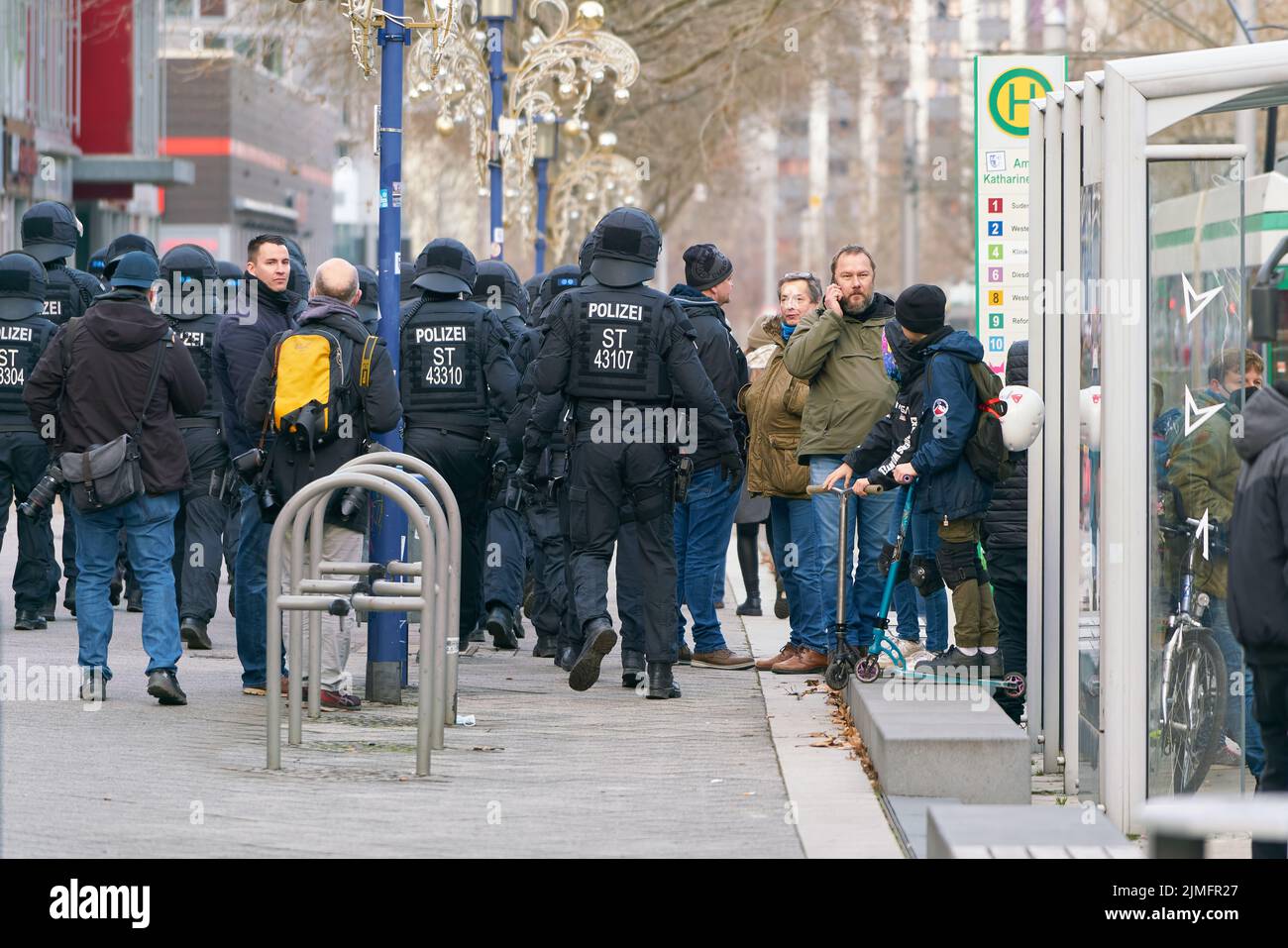 Police security forces during protests by opponents of the Corona measures in Magdeburg Stock Photo