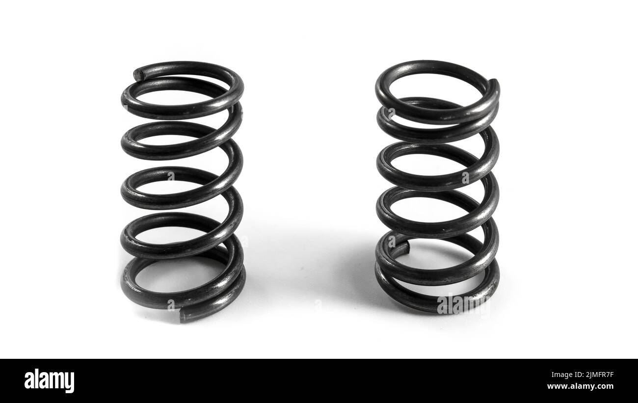 2 car springs on a white background. Isolated spare parts for vehicle