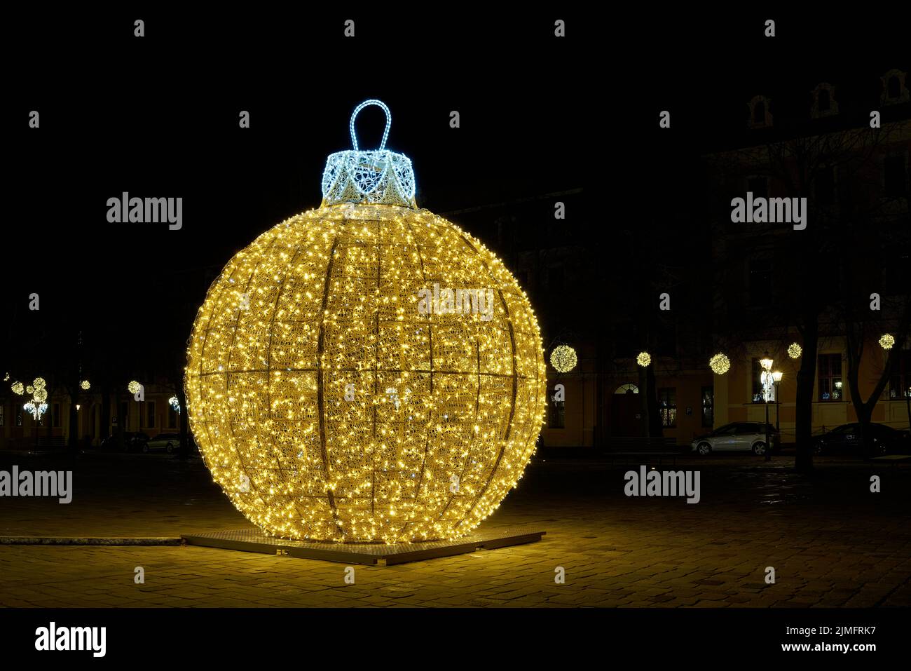 Illuminated Christmas decoration as attraction on the cathedral square