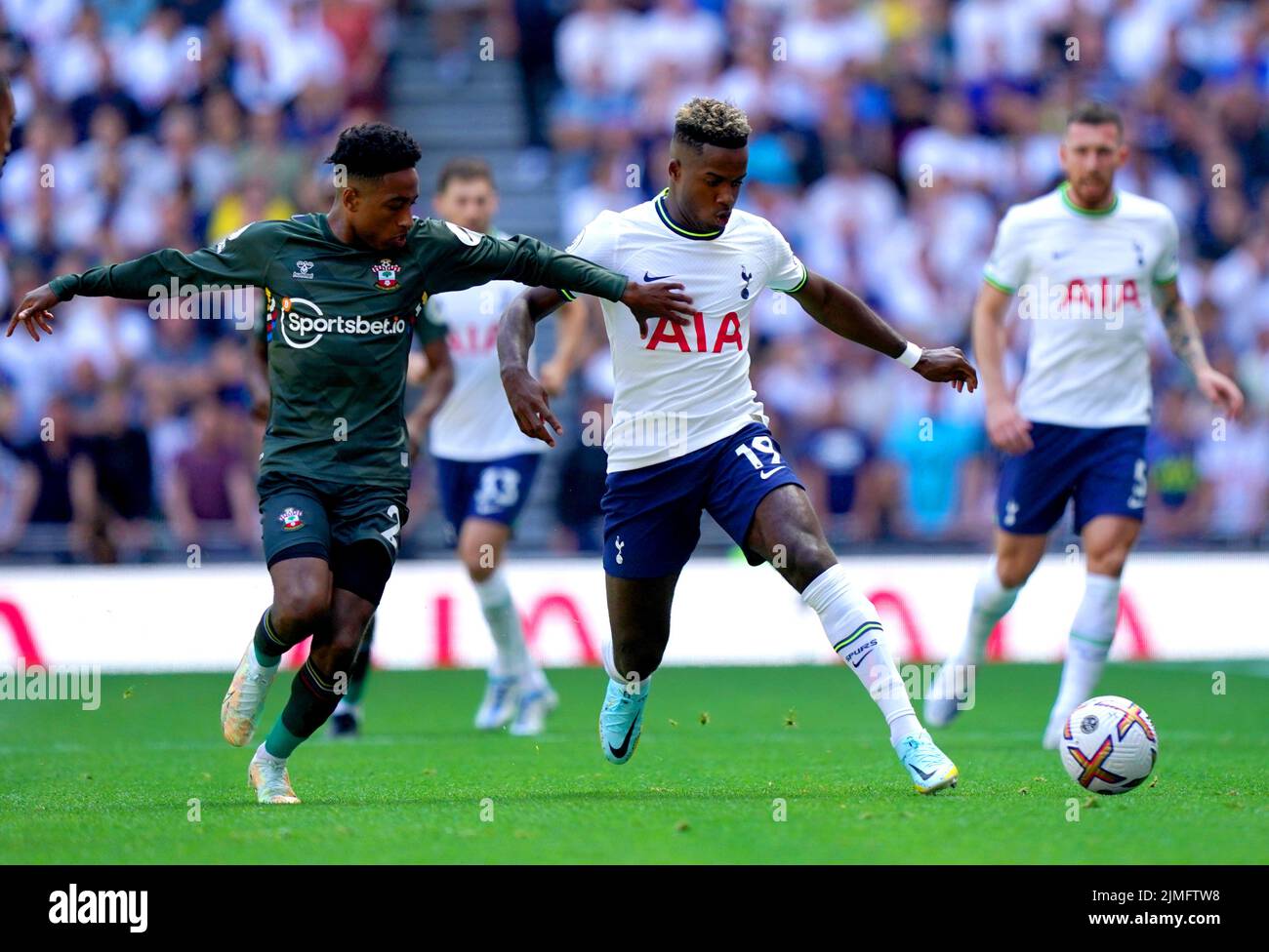 Southampton's Kyle Walker-Peters (left) and Tottenham Hotspur's Ryan Sessegnon battle for the ball during the Premier League match at Tottenham Hotspur Stadium, London. Picture date: Saturday August 6, 2022. Stock Photo