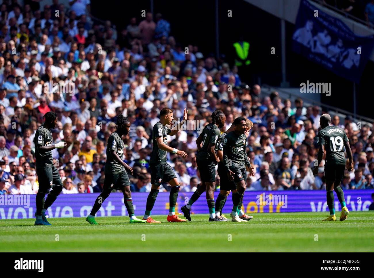 Southampton players celebrate after team-mate James Ward-Prowse scores their side's first goal of the game during the Premier League match at Tottenham Hotspur Stadium, London. Picture date: Saturday August 6, 2022. Stock Photo