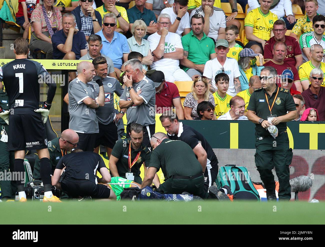 Norwich, UK. 06th Aug, 2022. Dimitris Giannoulis of Norwich City gets treatment as he lies in agony during the Sky Bet Championship match between Norwich City and Wigan Athletic at Carrow Road on August 6th 2022 in Norwich, England. (Photo by Mick Kearns/phcimages.com) Credit: PHC Images/Alamy Live News Stock Photo