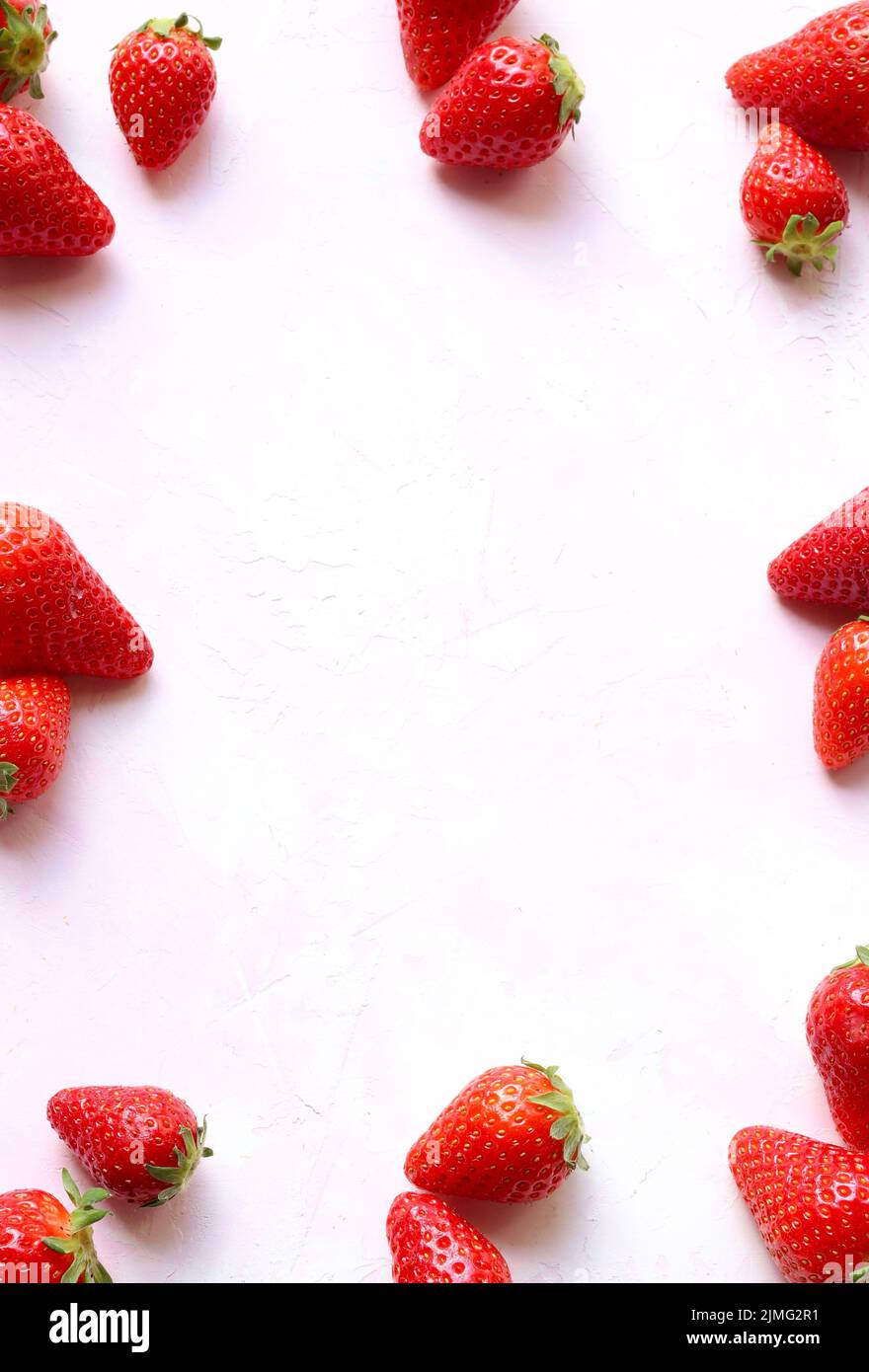 Fresh strawberries pattern on white background. Directly above. Copy space. Stock Photo