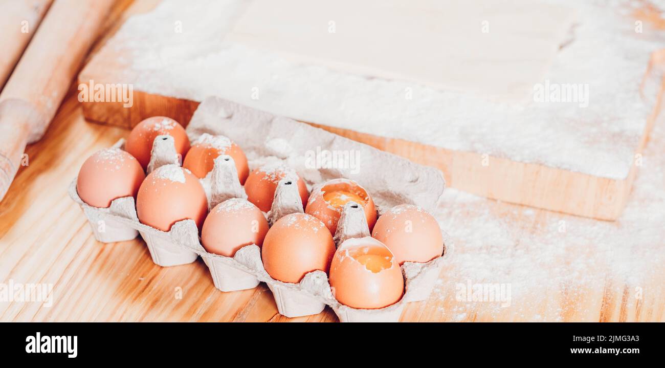 chicken eggs flour baking pastry dough ingredients Stock Photo