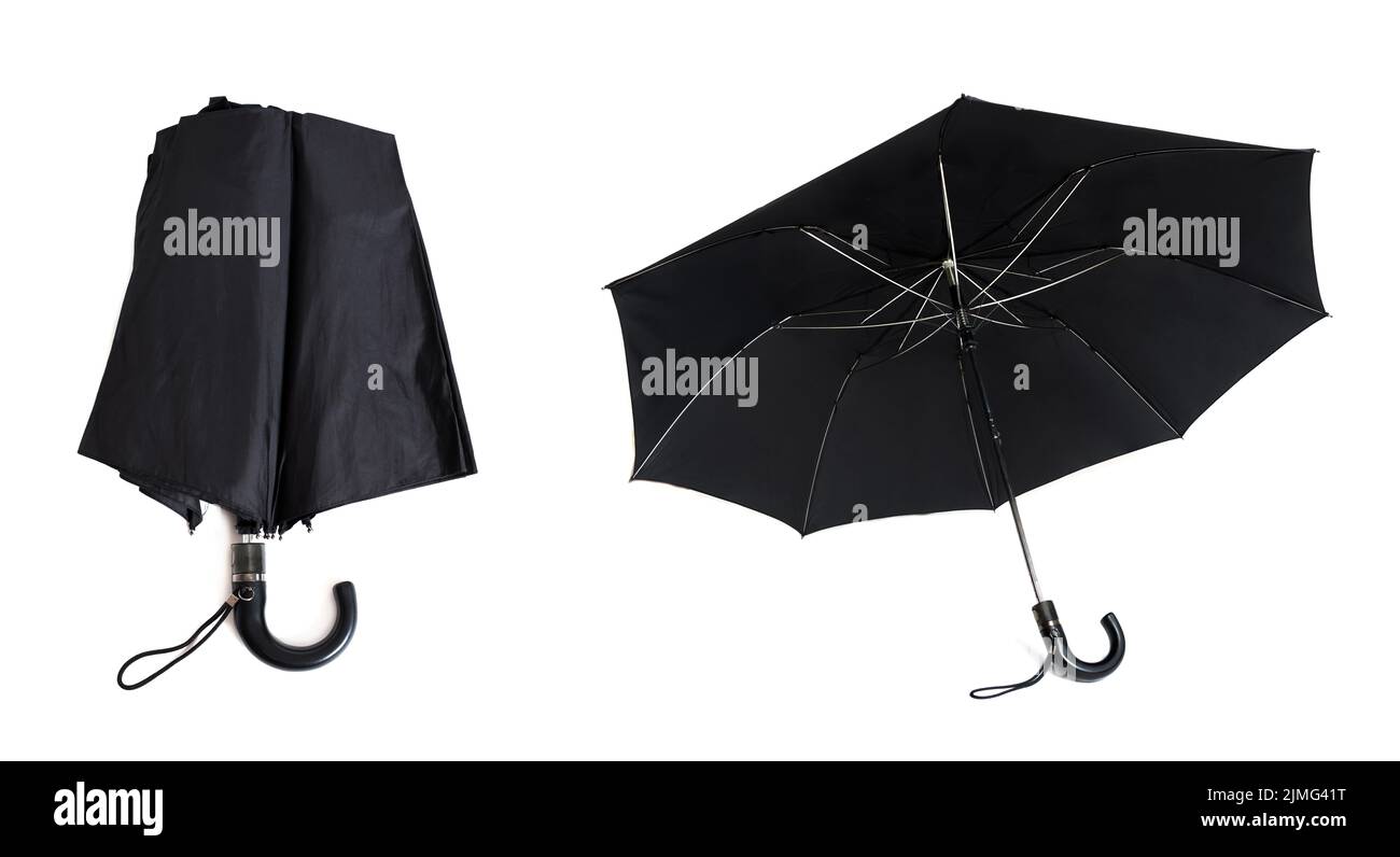 Folded and unfolded black rain umbrellas isolated on white background