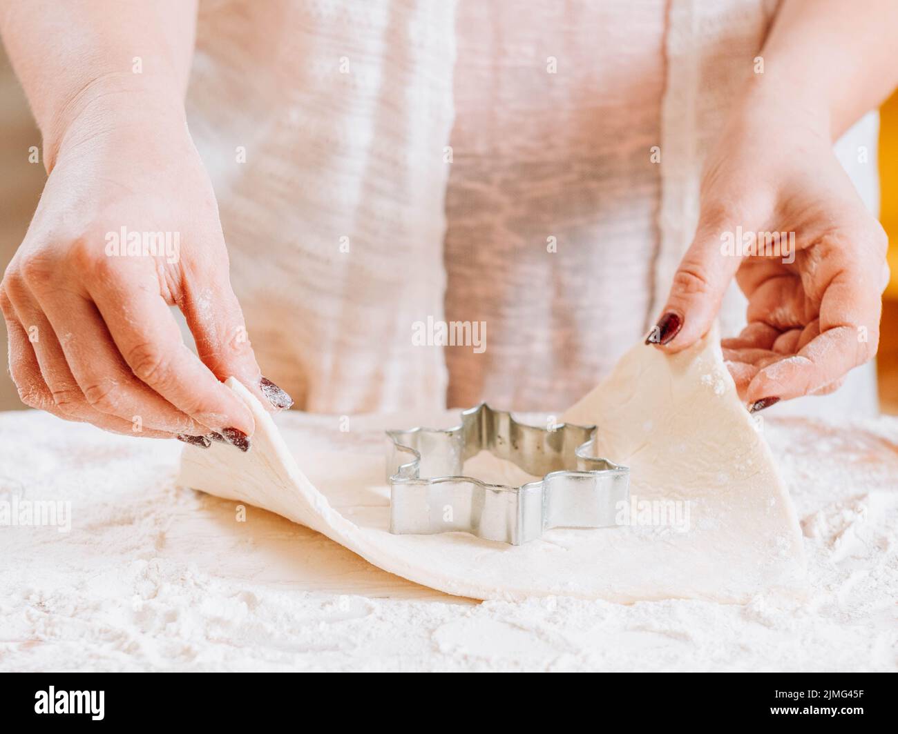 home baking woman hands cookie cutter pastries Stock Photo