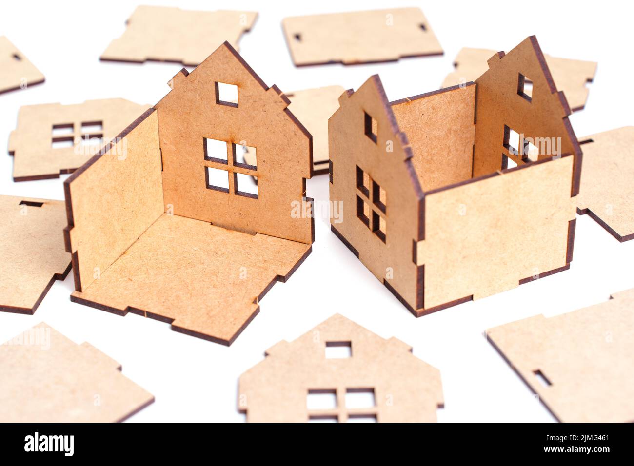 Wooden toy house kit with parts isolated on white Stock Photo - Alamy