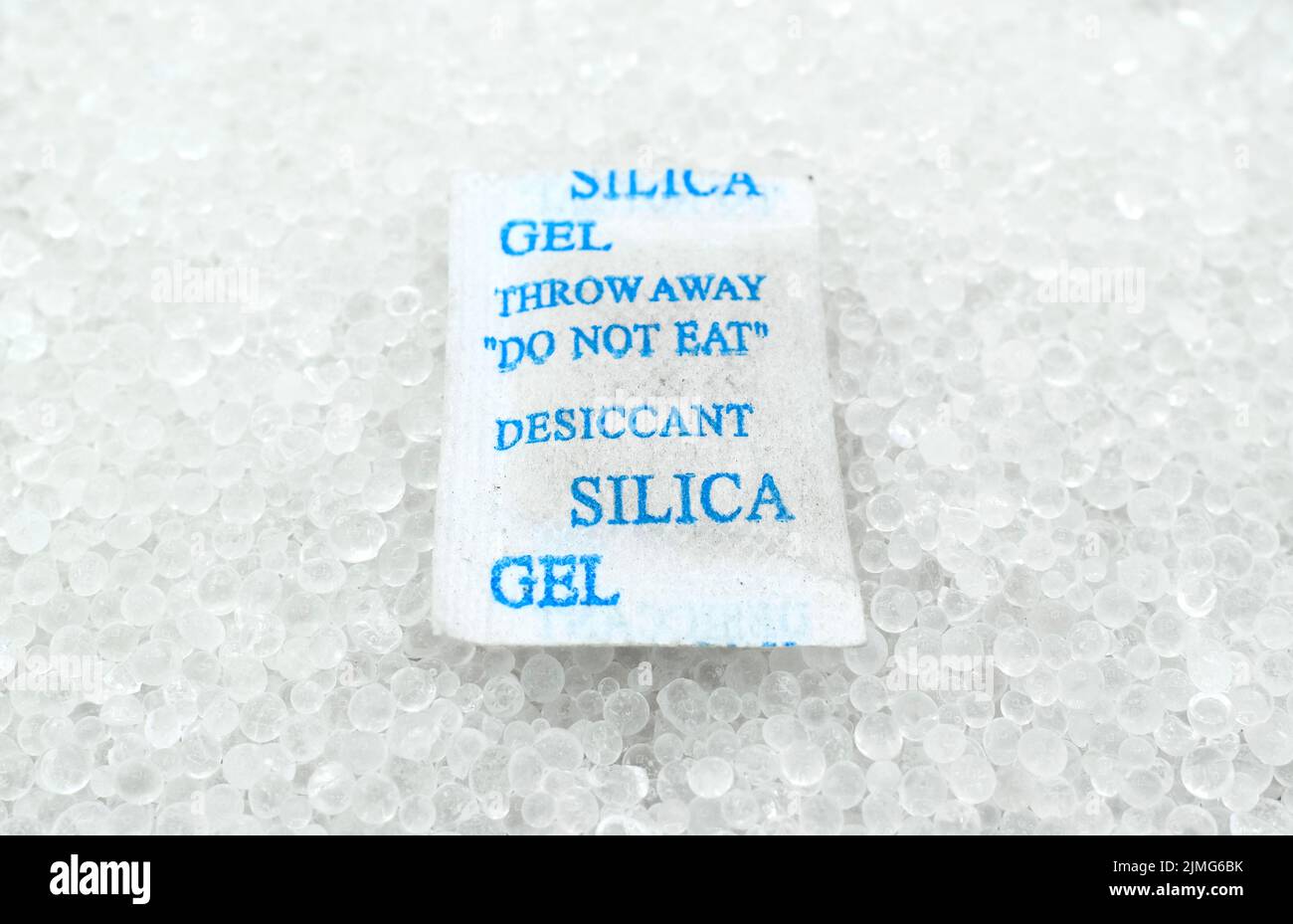 Sachet of new silica gel crystals. It is a desiccant. It adsorbs and