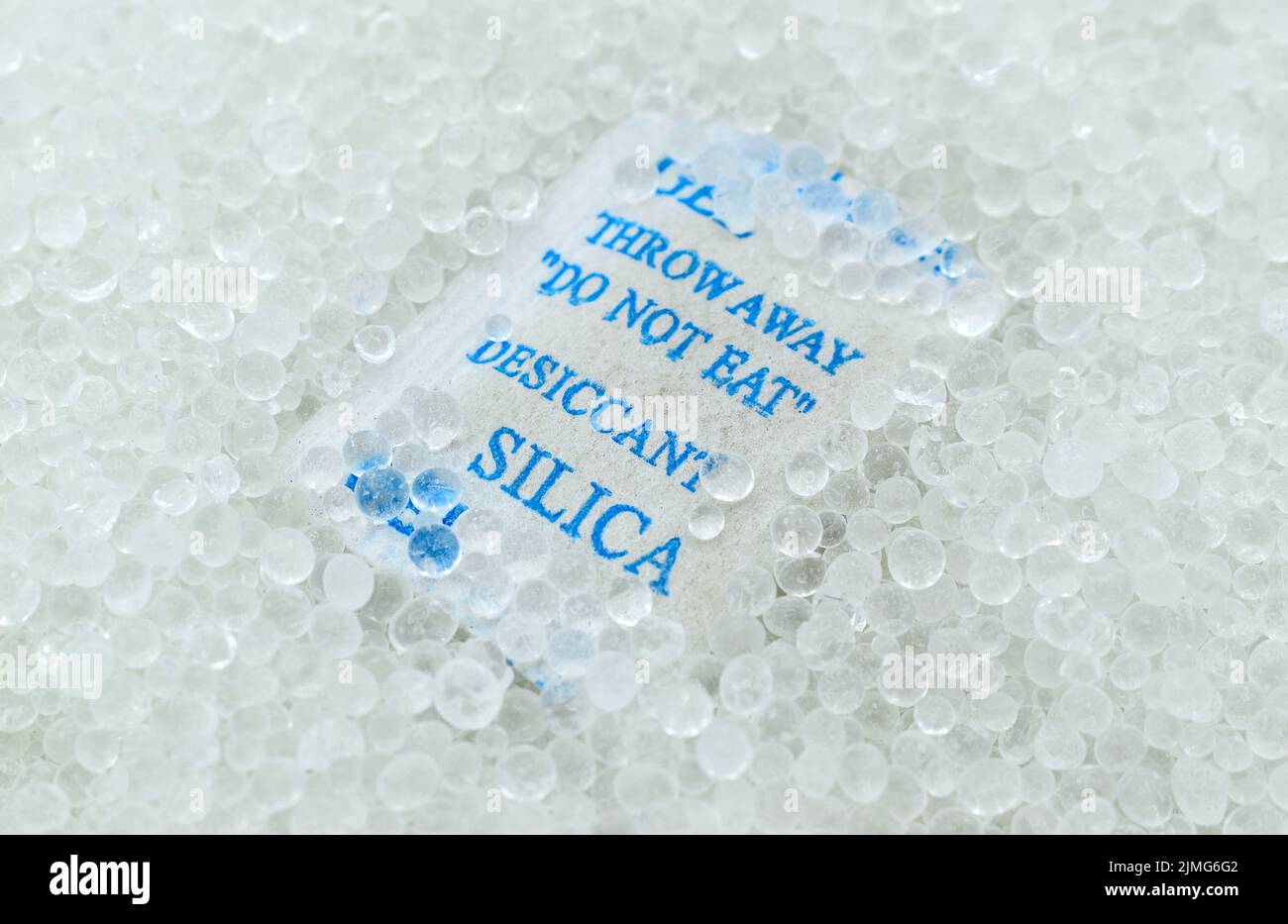 Sachet of new silica gel crystals. It is a desiccant. It adsorbs and