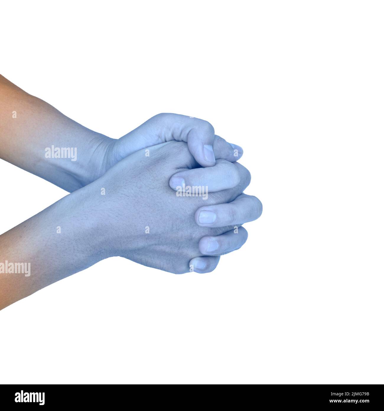 Clasped hands together with light blue color of Asian young man. Concept of cold and clumsy hand. Stock Photo
