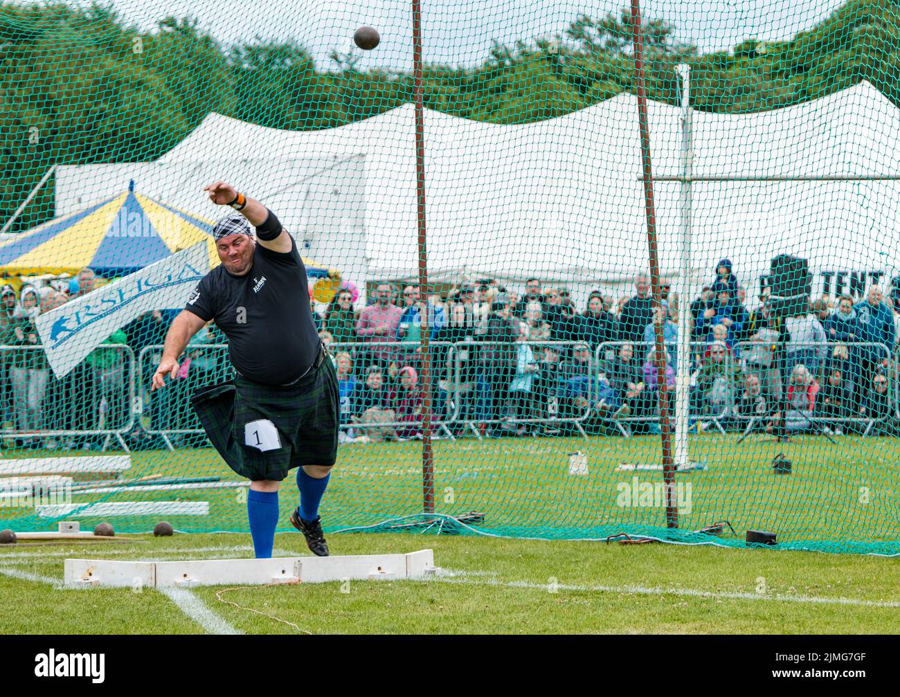 North Berwick, East Lothian, Scotland, United Kingdom, 6th August 2022. North Berwick Highland games: the annual games takes place at the recreation ground in the seaside town. Pictured: Peter Hart competes in the shotput competition. Credit: Sally Anderson/Alamy Live News Stock Photo