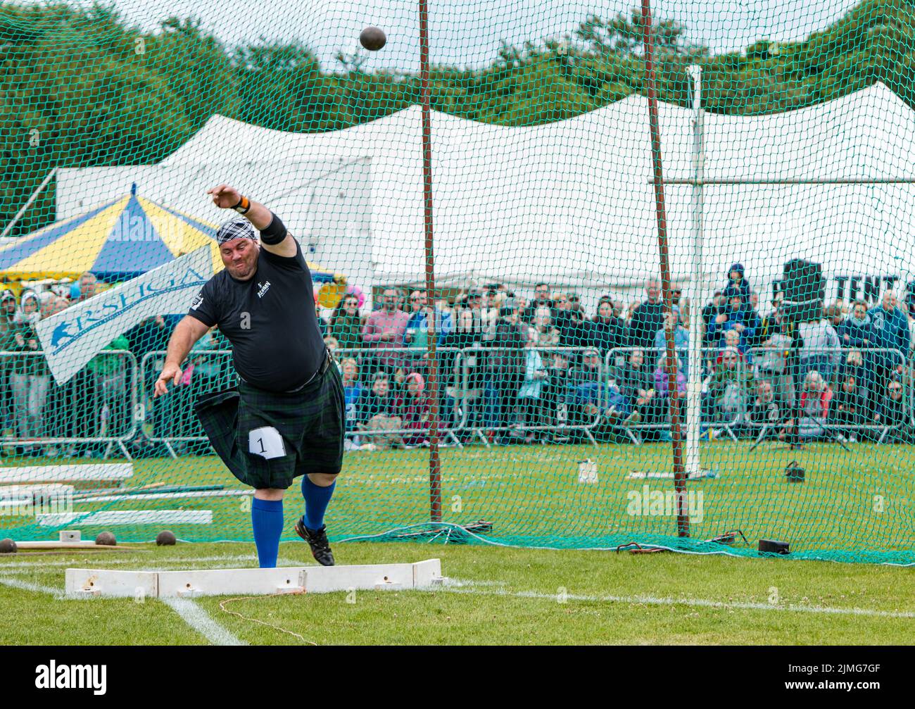 North Berwick, East Lothian, Scotland, United Kingdom, 6th August 2022. North Berwick Highland games: the annual games takes place at the recreation ground. Pictured: Peter Hart competes in the shot put competition. Stock Photo