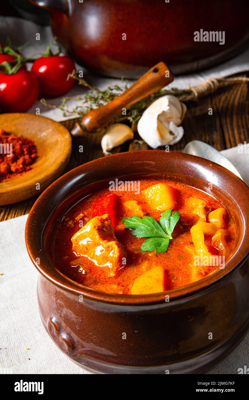 Hungarian goulash soup in a cauldron or pot Stock Photo Alamy