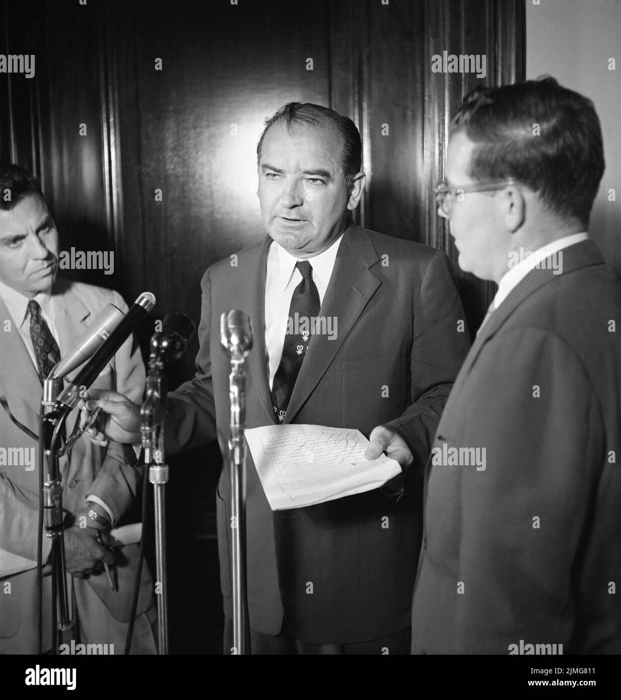 U.S. Senator from Wisconsin Joseph McCarthy at microphone during Press Conference, Washington, D.C., USA, Thomas J. O'Halloran, U.S. News & World Report Magazine Photograph Collection, June 1954 Stock Photo