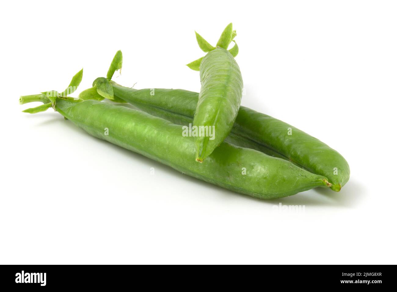 Sweet pea pods isolated on white background. Vegetarian food. Stock Photo