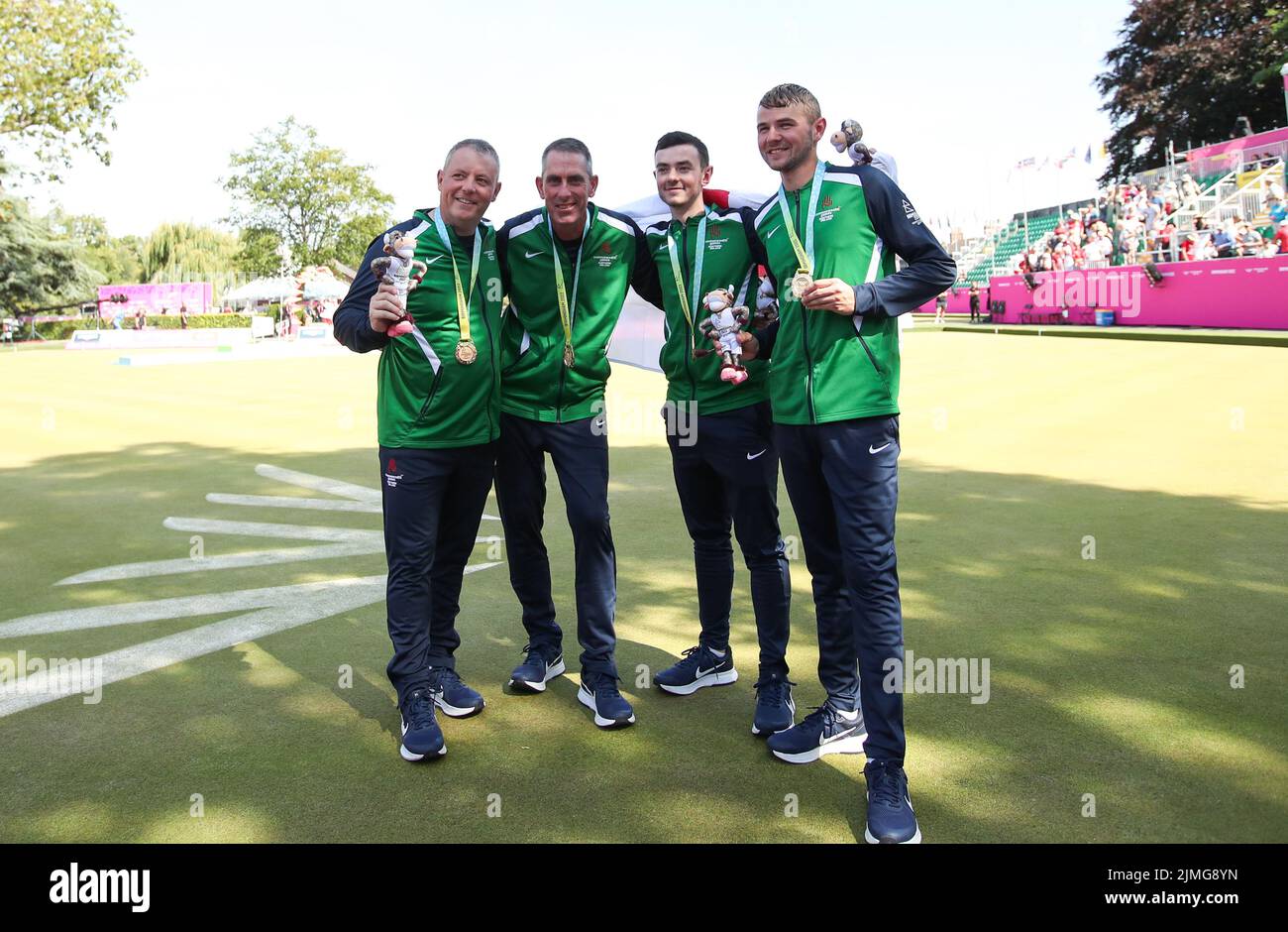 Northern Ireland’s Ian McClure, Adam McKeown, Sam Barkley and Martin McHugh pose on for a photograph after winning a gold medal during Men's Fours Lawn Bowls - medal ceremony at Victoria Park on day nine of the 2022 Commonwealth Games in Birmingham. Picture date: Saturday August 6, 2022. Stock Photo