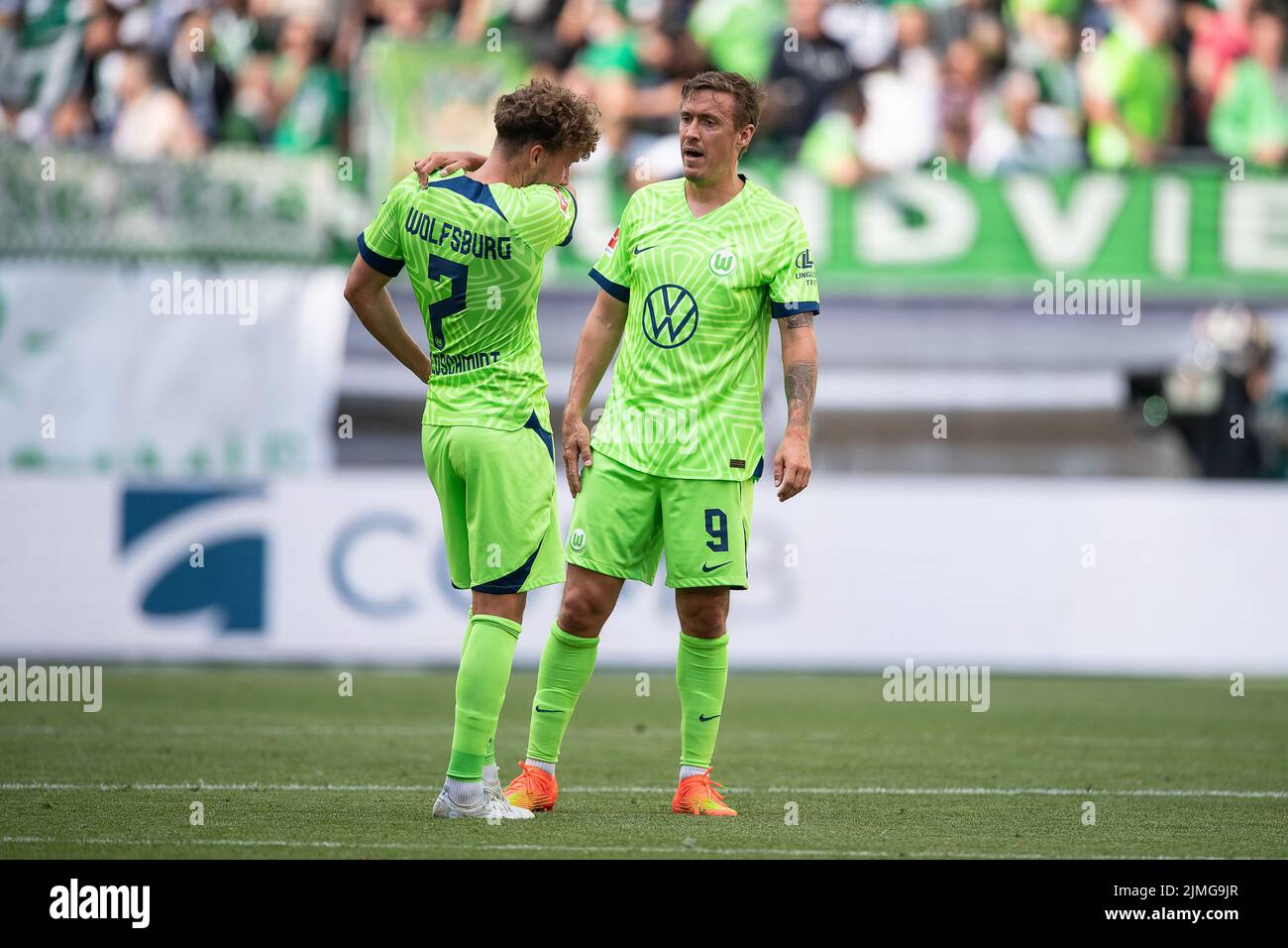 Wolfsburg, Germany. 06th Aug, 2022. Soccer, Bundesliga, VfL Wolfsburg - SV Werder Bremen, Matchday 1, Volkswagen Arena. Wolfsburg's Max Kruse (r) and Wolfsburg's Luca Waldschmidt stand on the field after the match. Credit: Swen Pförtner/dpa - IMPORTANT NOTE: In accordance with the requirements of the DFL Deutsche Fußball Liga and the DFB Deutscher Fußball-Bund, it is prohibited to use or have used photographs taken in the stadium and/or of the match in the form of sequence pictures and/or video-like photo series./dpa/Alamy Live News Stock Photo