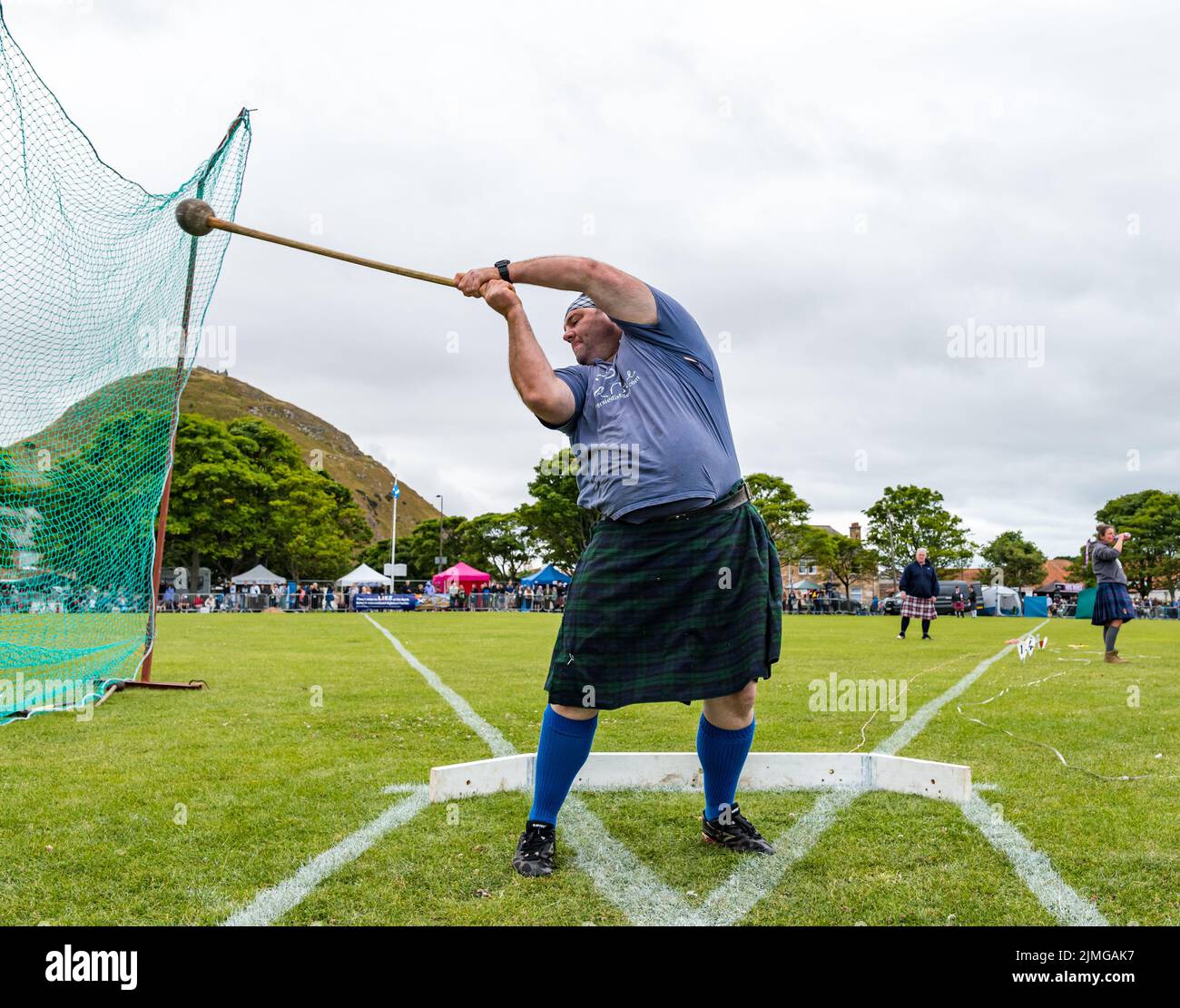 North Berwick, East Lothian, Scotland, United Kingdom, 6th August 2022. North Berwick Highland games: the annual games takes place at the recreation ground in the seaside town. Pictured: Peter Hart, a farmer from Perthshire tosses a hammer. Credit: Sally Anderson/Alamy Live News Stock Photo