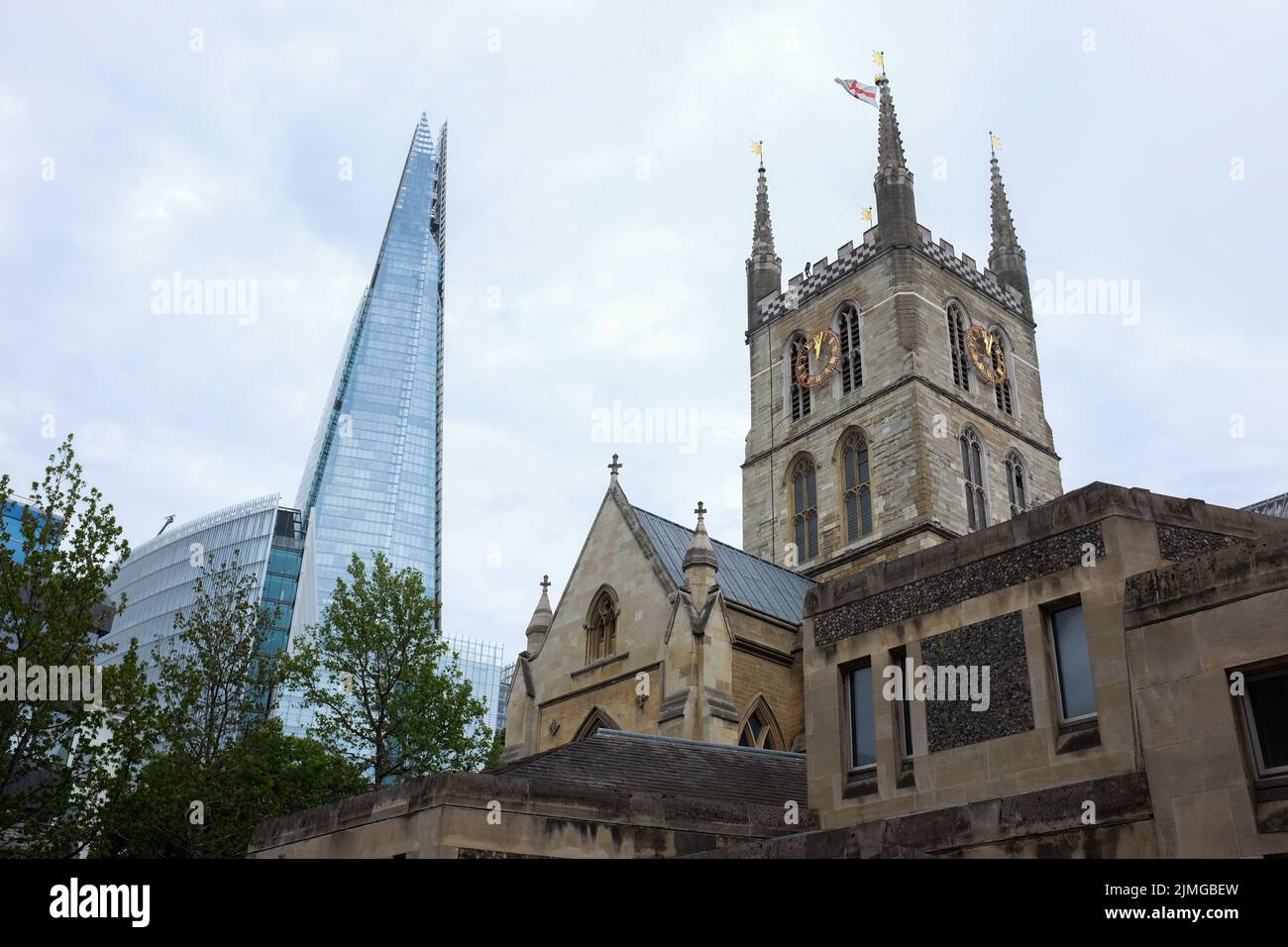 Southwark Cathedral in south London, England, with the Shard nearby. Stock Photo