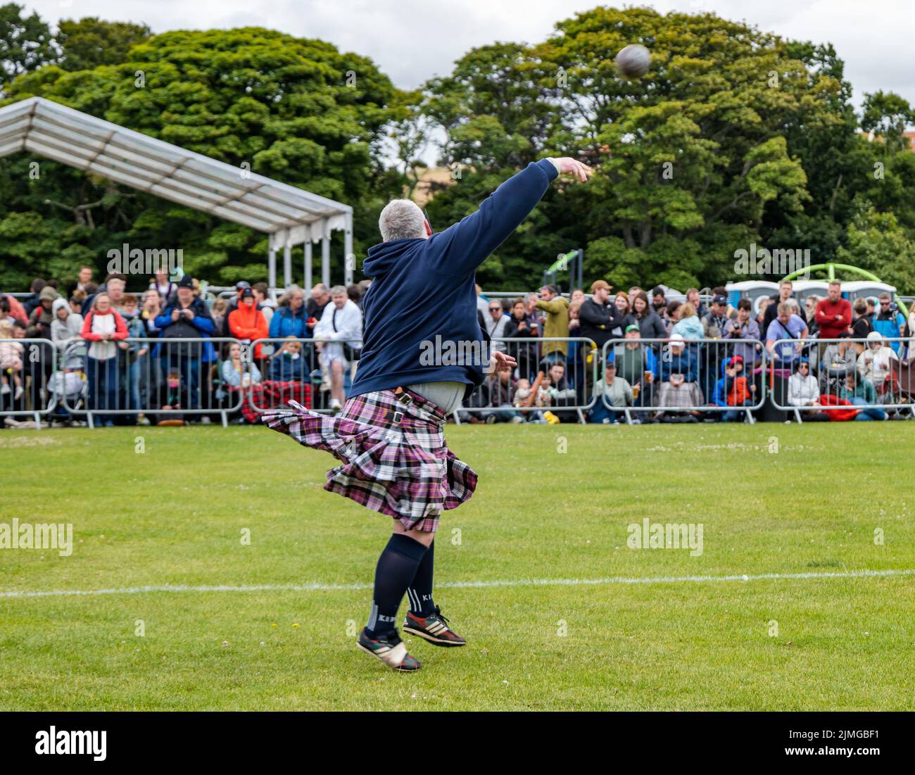 North Berwick, East Lothian, Scotland, United Kingdom, 6th August 2022. North Berwick Highland games: the annual games takes place at the recreation ground in the seaside town. Pictured: the shotput competition. Credit: Sally Anderson/Alamy Live News Stock Photo