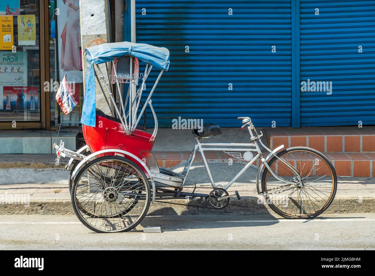 Old bike rickshaw rikshaw trishaw in Don Mueang Bangkok Thailand Stock