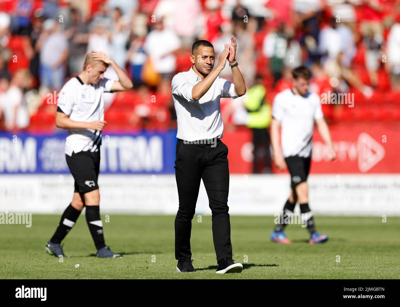 Derby County interim manager Liam Rosenior (centre) applauds the away fans after the Sky Bet League One match at The Valley, London. Picture date: Saturday August 6, 2022. Stock Photo