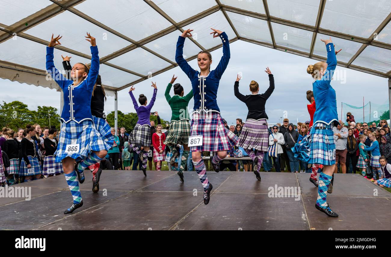 North Berwick, East Lothian, Scotland, United Kingdom, 6th August 2022. North Berwick Highland games: the annual games takes place at the recreation ground in the seaside town. Pictured:the Junior Highland Dancing competition Credit: Sally Anderson/Alamy Live News Stock Photo