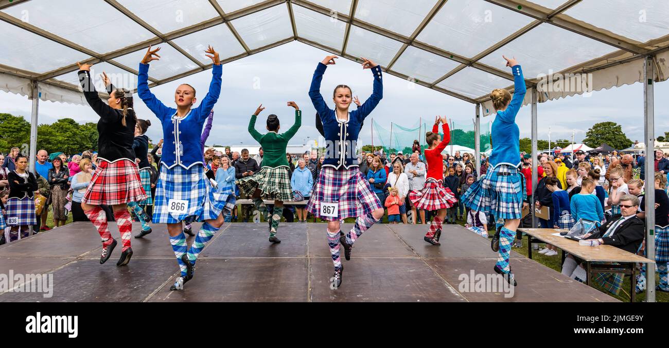 North Berwick, East Lothian, Scotland, United Kingdom, 6th August 2022. North Berwick Highland games: the annual games takes place at the recreation ground. Pictured: the Junior Highland Dancing competition Stock Photo