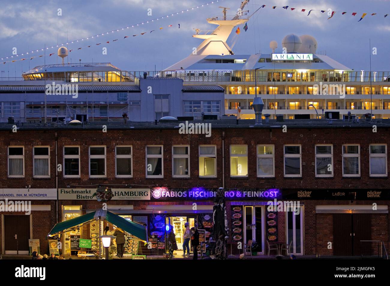 Fish market shops and cruise ship Artania at Hamburg Cruise Center