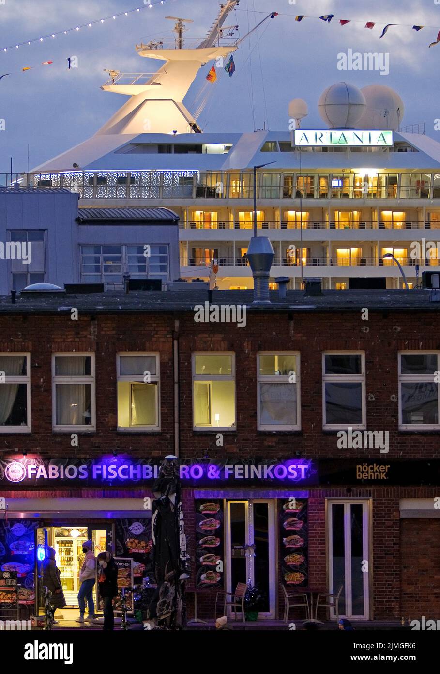 Fish market shops and cruise ship Artania at Hamburg Cruise Center