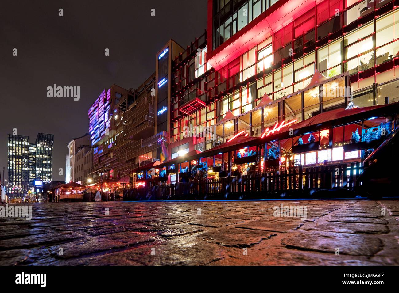 Neon lights at Spielbudenplatz with the Dancing Towers in the background, Hamburg, Germany, Europe Stock Photo