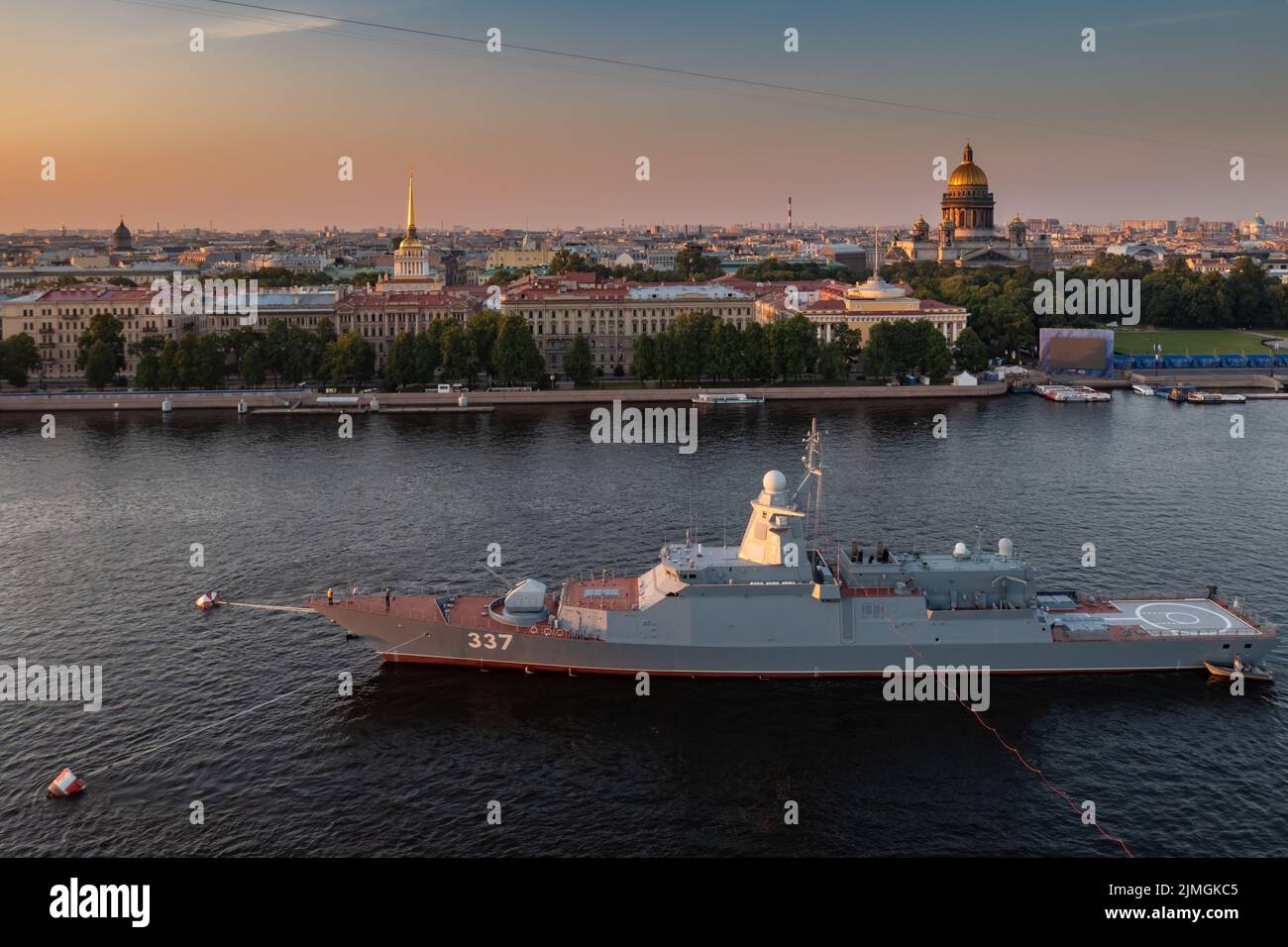 Aerial morning urban landscape with warships in the waters of the Neva River before the holiday of the Russian Navy, sea power, Stock Photo