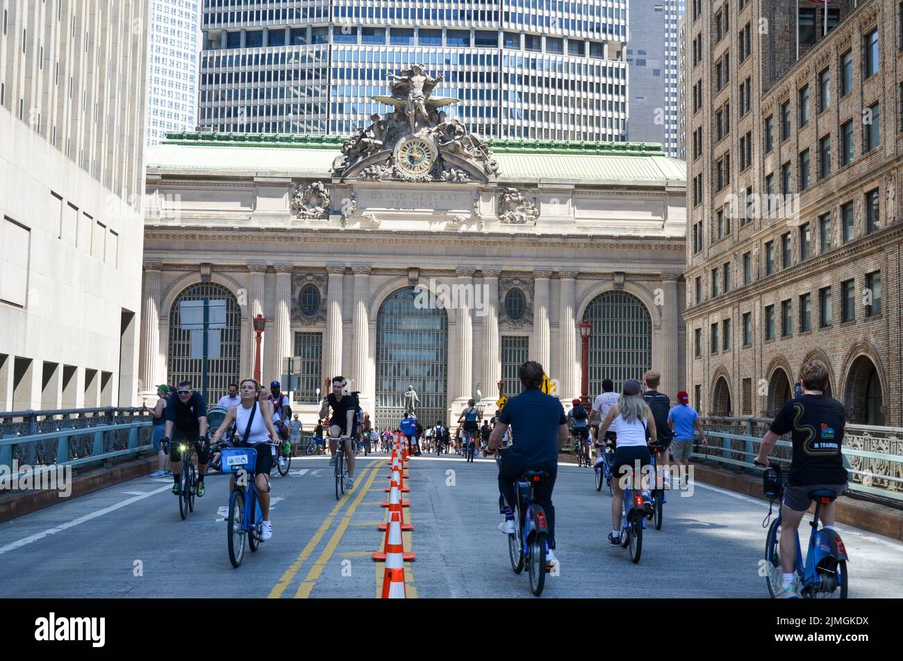 New Yorkers are seen biking on Park Avenue near Grand Central during car free “Summer Streets” along Park Avenue in New York City. Stock Photo