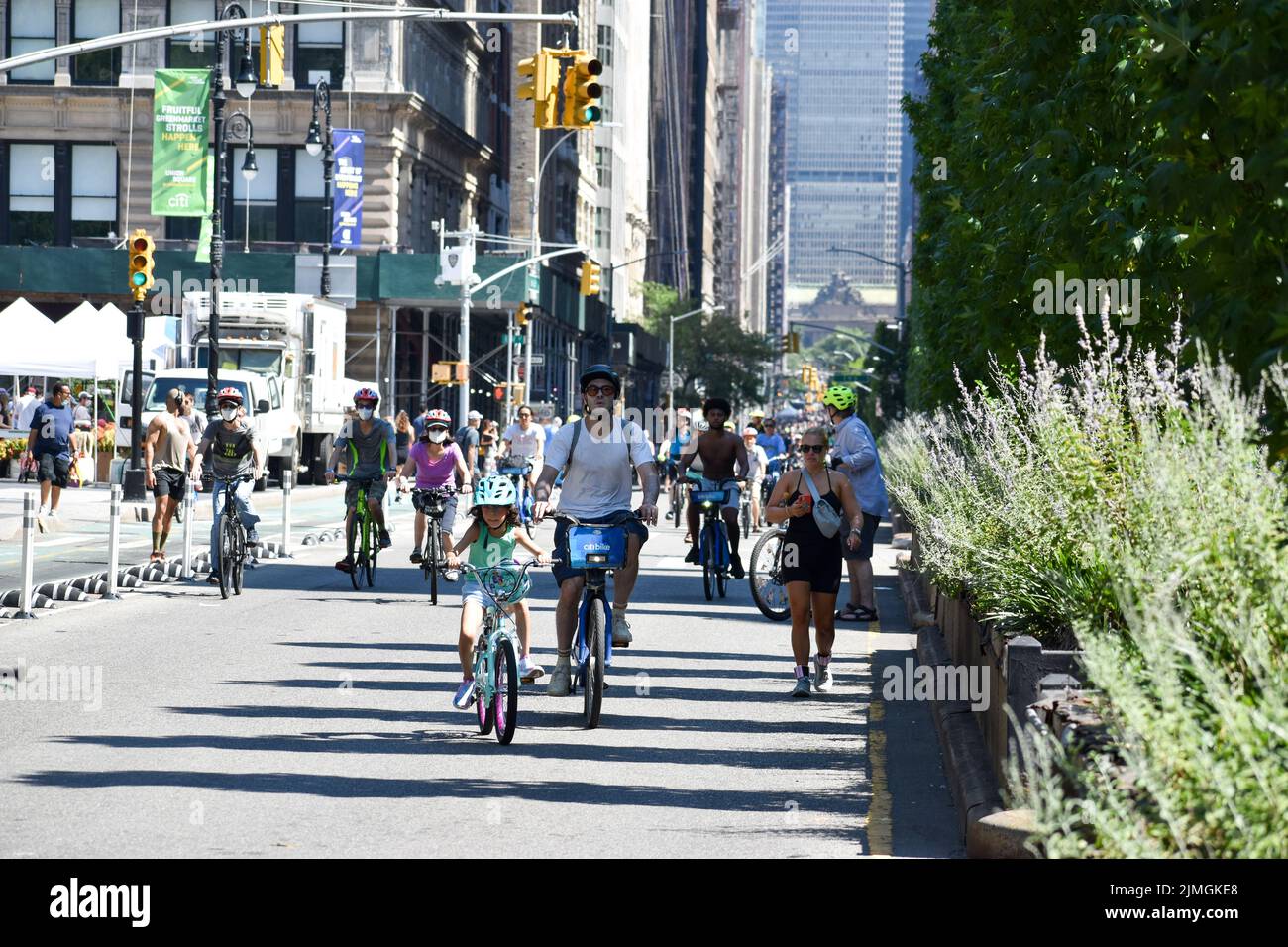 New Yorkers of all ages are seen biking on Park Avenue near Grand