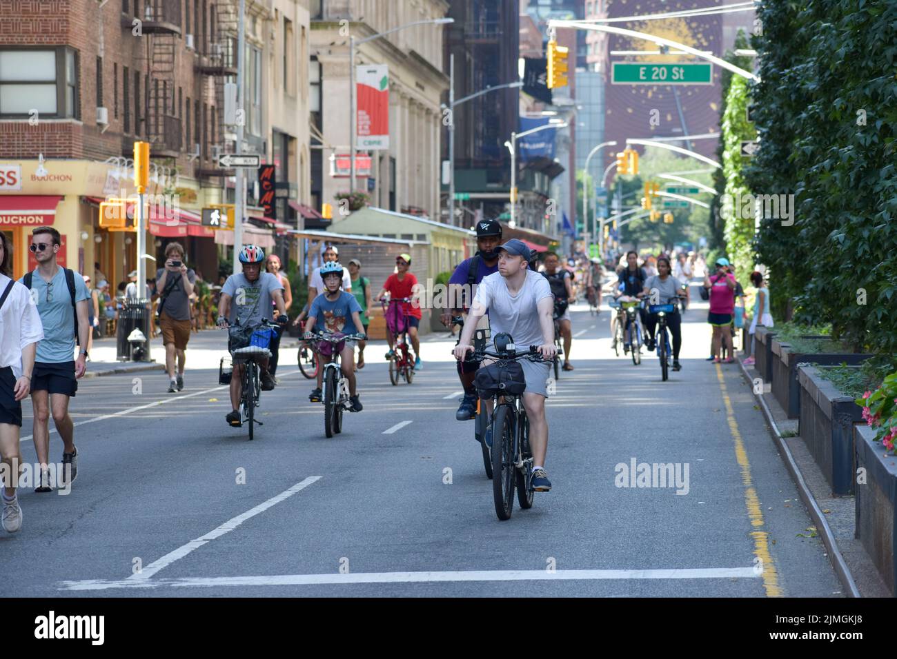 New Yorkers are seen biking on Park Avenue near Union Square during car free “Summer Streets” along Park Avenue in New York City. Stock Photo